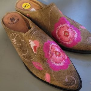Beautiful suede embroidered slides with metal toe plate.